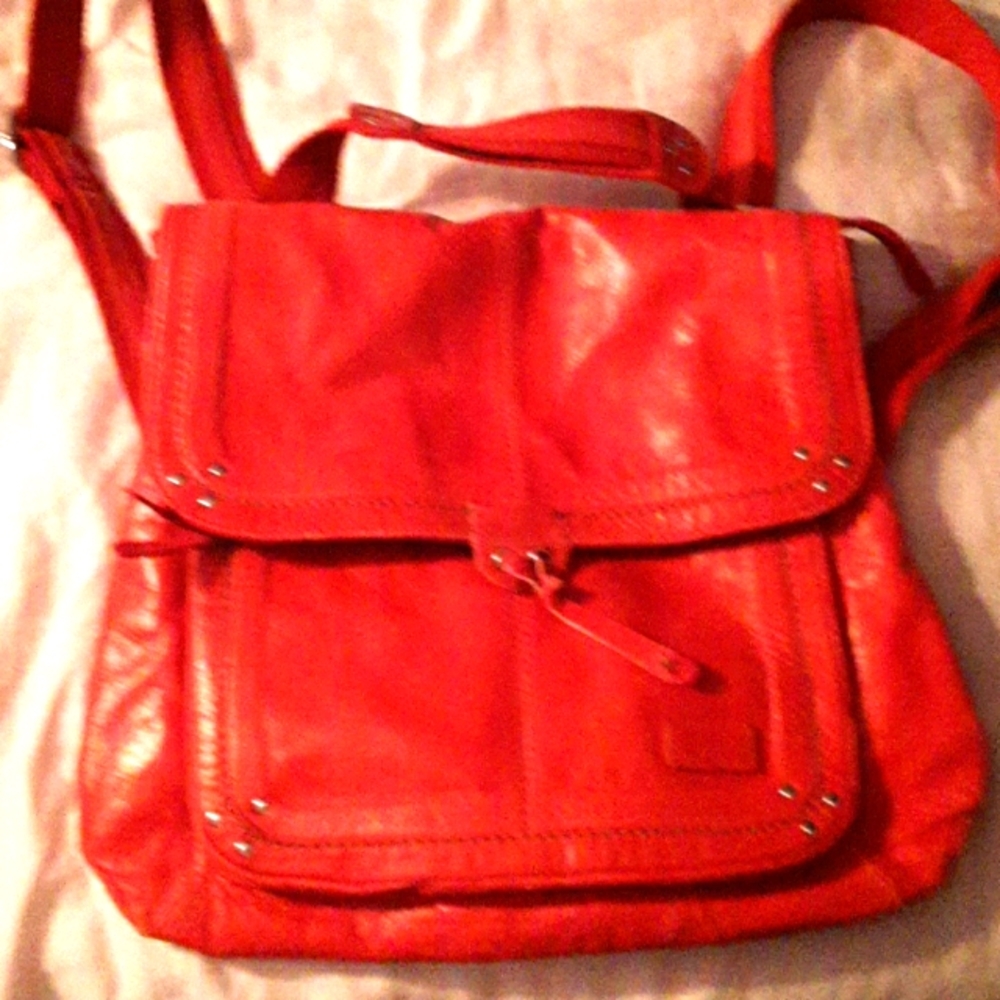 A red leather backpack